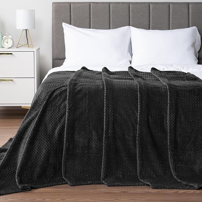 PAVILIA Soft Fleece Solid Black Throw Blanket for Couch, Lightweight Plush Warm Blankets for Bed, Fuzzy Cozy Flannel Blanket Throw for Sofa, Travel, Jacquard Pattern, Black, Twin, 60x80 inch